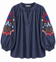 BlusA con mangas bombachas bordadas marino